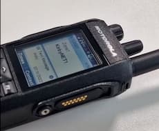 How do walkie talkies communicate without a network?